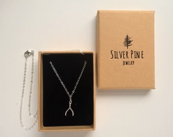 Collana con ciondolo a fora di cornetto italiano, color argento