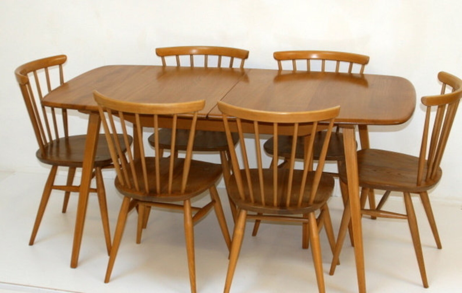 Ercol Grand Windsor extending dining table seats 1012 when Etsy