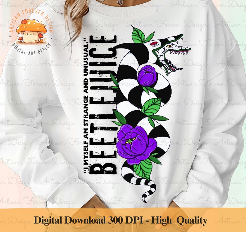 May include: White sweatshirt with a black and white striped design of a creature with a large mouth and purple flowers. The text "I myself am strange and unusual." and "Beetlejuice" are printed on the shirt.