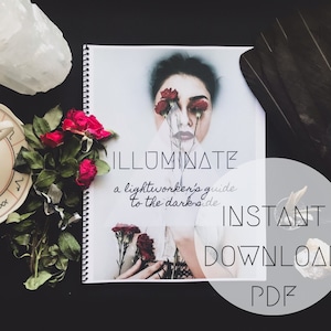 May include: A white book with a black and white image of a woman with red roses over her eyes. The book title is "ILLUMINATE" and the subtitle is "a lightworker's guide to the dark side". The text "INSTANT DOWNLOAD PDF" is in a circle around the book.