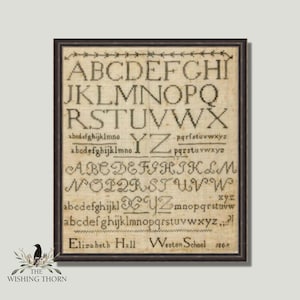 May include: A framed sampler with the alphabet in black embroidery on a cream-colored fabric. The sampler is signed "Elizabeth Hall Weston School 1809".