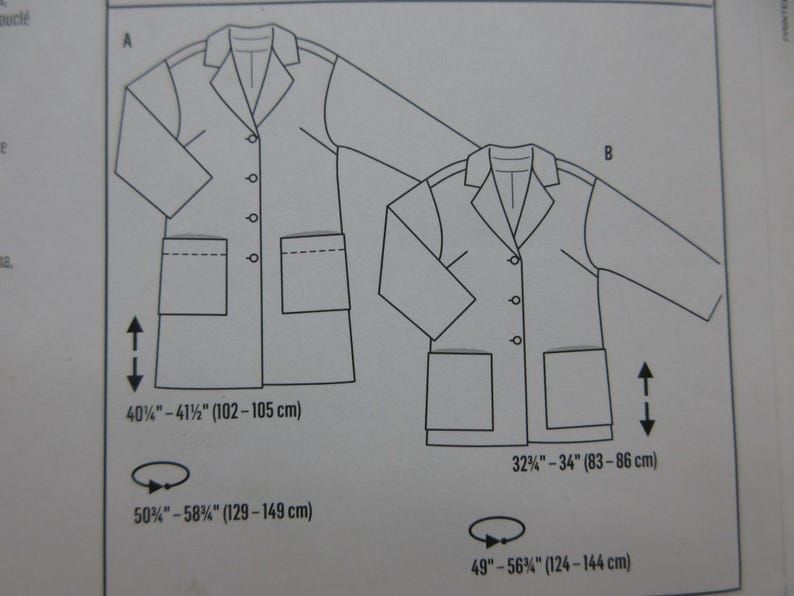 May include: Line drawing of two blazers with measurements. Blazer A is 40&frac34;"-41&frac12;" (102-105 cm) long and 50&frac34;"-58&frac34;" (129-149 cm) wide. Blazer B is 32&frac34;"-34" (83-86 cm) long and 49"-56&frac34;" (124-144 cm) wide.