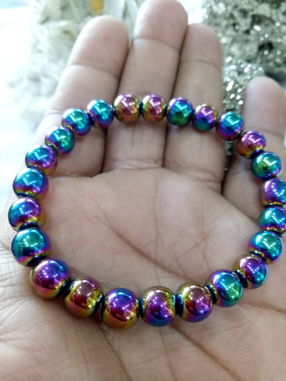 Buy Crystal Cave Exports Matte Rainbow Aura Quartz 8 MM Bracelet Divine  Feminine Light - Spiritual Growth - Intuition - Higher Self Awareness  Crystal Healing Balance Bracelet at Amazon.in