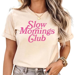 Slow Mornings club (PINK) -shirt, retro aesthetic coffee club shirt, lazy mornings, coffee and croissant, trendy coffee culture coffee lover