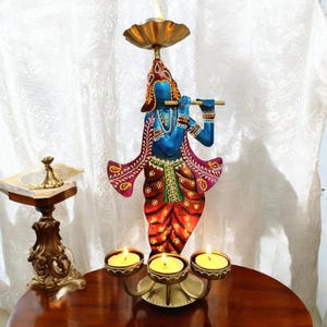 Lord krishna Tealight Holder for home temple puja room decor , Tealight for Home/Office, Living Room, Pooja Room Decorative Showpiece