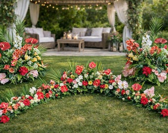 May include: Outdoor floral arrangements featuring red, pink, and white flowers with green foliage. The arrangements are set on a grassy lawn, with a gazebo and seating in the background. The flowers include anthuriums and other tropical blooms.