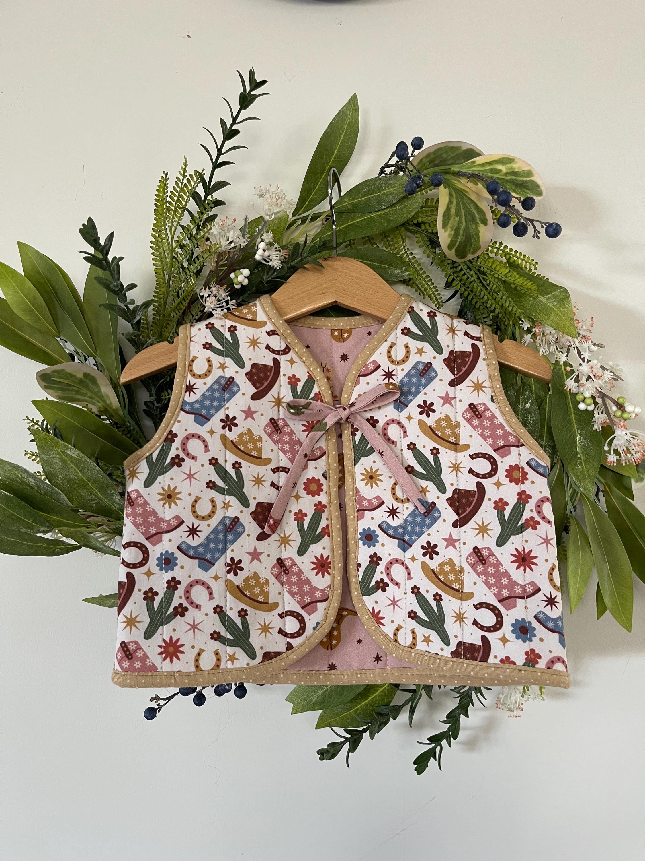 Children Quilted Vest/Tie Front Reversible girls Vest made out of cotton poplin in a fun Cowgirl print