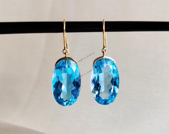 18Kゴールド 天然スイスブルートパーズ イヤリング オーバル 12月