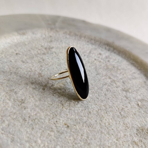 Oval black onyx ring deals