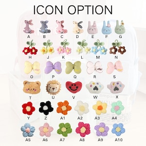 Puede incluir: Una colecci&oacute;n de adornos de tela variados, que incluyen formas de animales, lazos, flores y huellas de patas. La imagen incluye el texto "ICON OPTION". Cada dise&ntilde;o est&aacute; etiquetado con una letra o un n&uacute;mero.