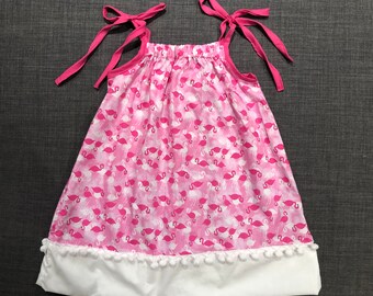 Tara - Casual Girls Sundress, Pillowcase Dress, Pink Flamingo Fabric Pattern, White Pom-Pom Trim