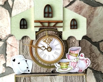 Wooden cuckoo clock inspired by Wonderland, handmade, with ornaments, functional mechanism, and space for a mini album.