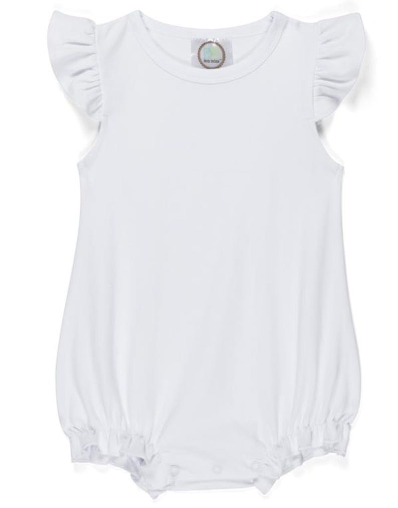 May include: A white baby romper with frilled sleeves and a round neckline. The romper has a bubble shape with elastic at the leg openings. A small tag is visible on the neckline.