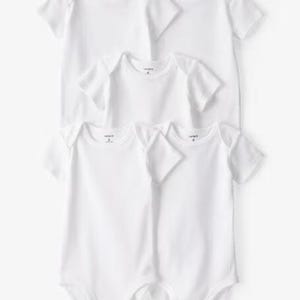 May include: Six white baby bodysuits with short sleeves are stacked. The bodysuits are plain and have a simple design. The brand name "Carter's" is printed on the front of each bodysuit.