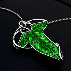 Women&#39;s brooch in the shape of a green leaf. round brooch, unique brooch.