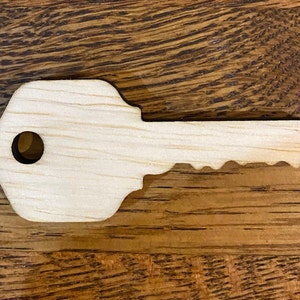 Llave cortada con láser en blanco, llave de madera en blanco, signo de llave, signo de agente inmobiliario, madera cortada con láser, signo de propietario nuevo