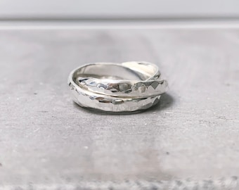 Sterling silver hammered rolling ring