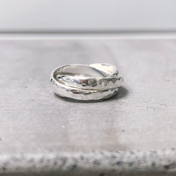Sterling silver hammered rolling ring