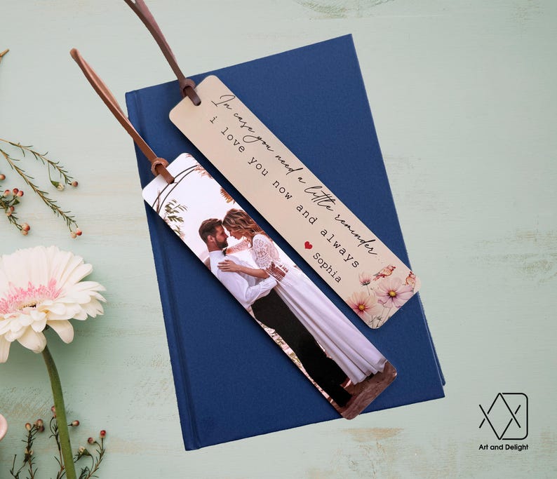 May include: Two bookmark designs with a couple in a photo on one and a floral design with the text "In case you need a little reminder I love you now and always Sophia" on the other.