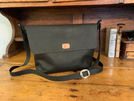 black purse with outside pockets
