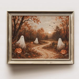 May include: A framed landscape painting depicting a winding dirt path through an autumn forest with orange foliage. Three white sheet ghosts stand among the trees and bushes, accompanied by three glowing jack-o'-lanterns on the ground.