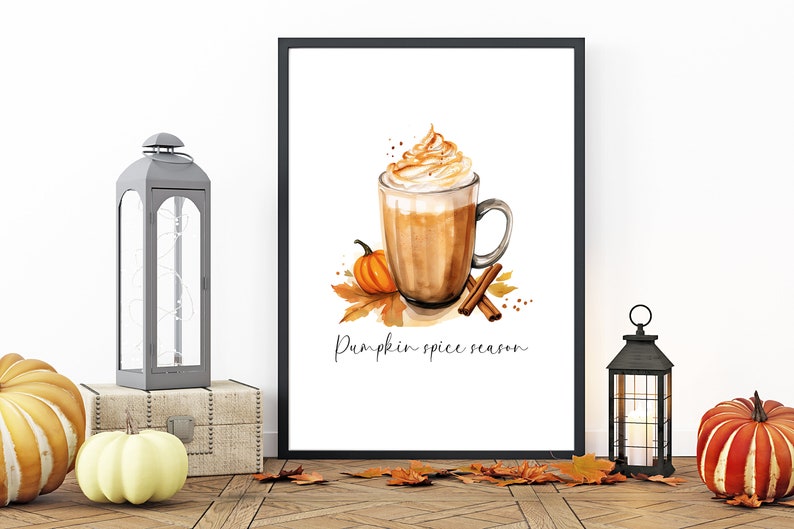 May include: A framed watercolor illustration of a pumpkin spice latte with whipped cream and cinnamon sticks. The text "Pumpkin spice season" is written below the latte.