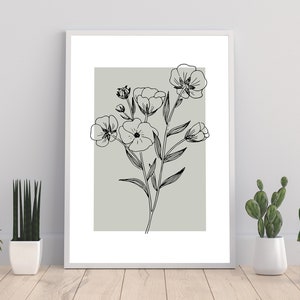 Pode incluir: Um desenho a preto e branco de flores sobre um fundo verde claro. O desenho est&aacute; emoldurado numa moldura branca e &eacute; apresentado numa parede branca.