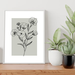 Pode incluir: Um desenho de linha preto e branco emoldurado de um buqu&ecirc; de flores em um fundo cinza claro.