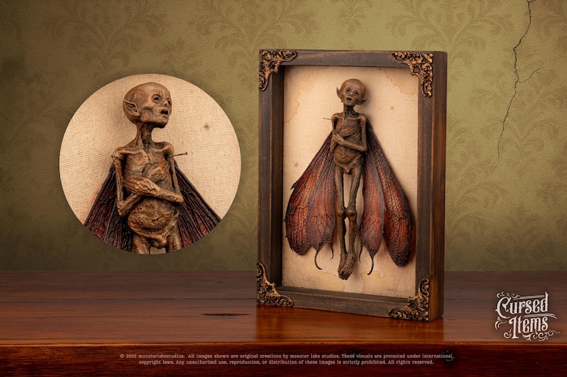 Angled view of fairy in frame with close-up of head and delicate wings.
