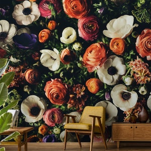 May include: A floral wallpaper mural featuring a close-up of a variety of colorful flowers, including white, pink, orange, and purple blooms. The flowers are arranged in a dense cluster, creating a vibrant and textured background.