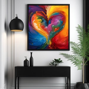 Puede incluir: Pintura abstracta de un corazón colorido con remolinos de pintura azul, amarilla, roja y morada. La pintura está enmarcada en negro y colgada en una pared blanca.