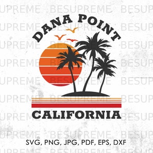 May include: A retro-style graphic design featuring a sunset with palm trees and the text "Dana Point California".