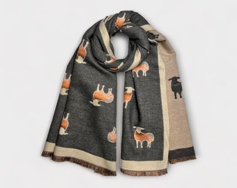 Grey Sheep woven print on cashmere blend scarf finished with tassels. Perfect present for him or her