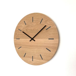 Modern wall clock made of oak wood, solid wood, solid wood, oak, model "slot black"