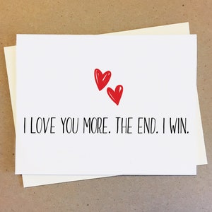 Je t'aime davantage. La fin. Je gagne. Carte d'anniversaire pour les couples. Je t'aime cadeaux.
