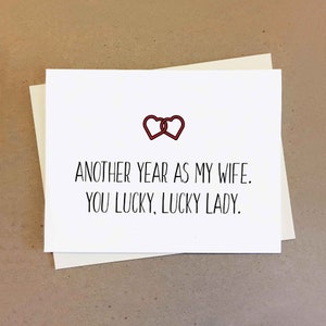 Funny anniversary card. Another year as husband and wife. Lucky man lucky lady. Personalisable card.