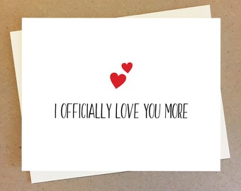 Sweet card for husband or wife. I officially love you more. Anniversary and celebration card.