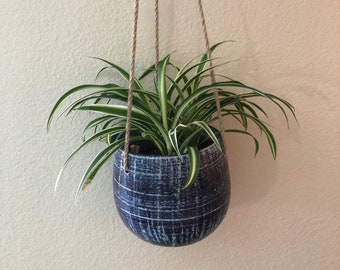 Blue patterned hanging planter with jute rope holes in 5 inch or smaller plant