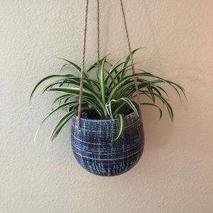 Blue patterned hanging planter with jute rope holes in 5 inch or smaller plant