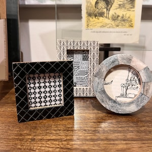 Black 2x2 square frame with diamond pattern
