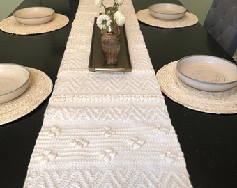 72”x14” cream Colored woven cotton textured table runner with pom-poms and tassels