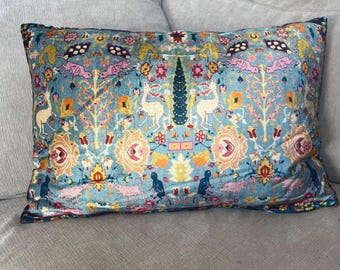 Blue velvet lumbar pillow with woodland design motif 24"L x 16"H