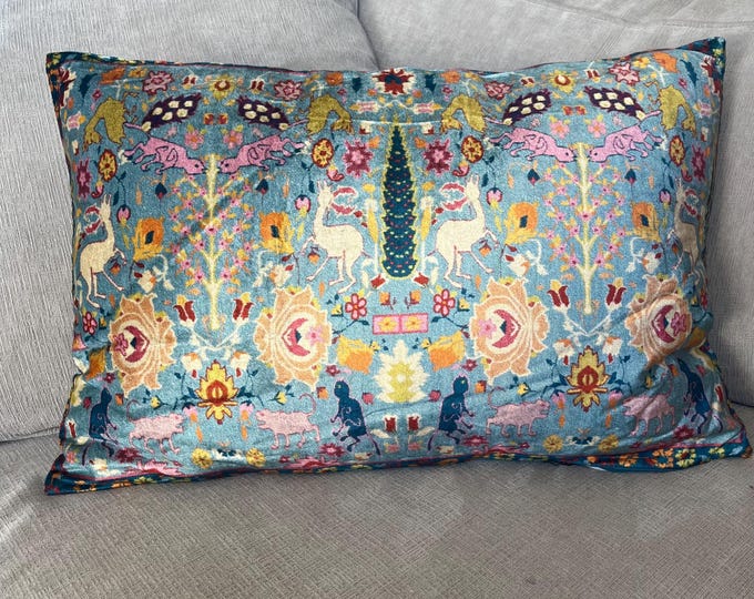 Blue velvet lumbar pillow with woodland design motif 24"L x 16"H
