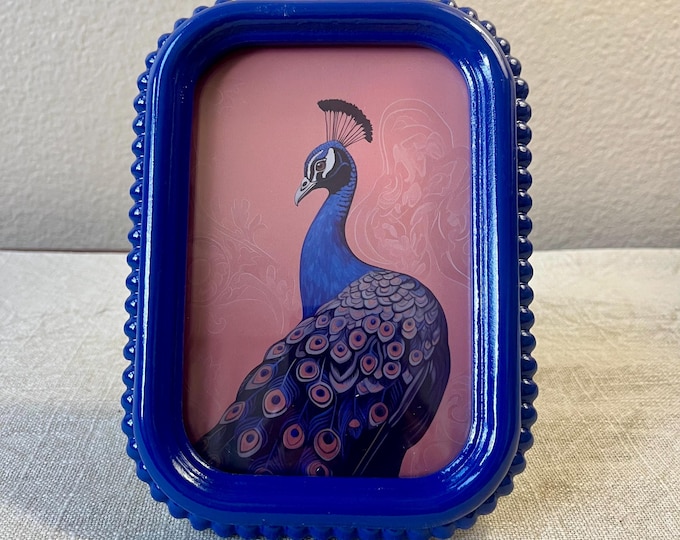 Vintage style blue 7” x 5” resin frame holda a 4”x 6” photo
