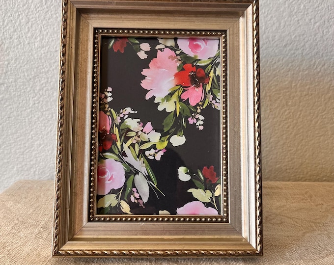 Vintage silver frame  8 3/4""x 6 3/4"  with ornate detailing holds a 4 1/4"x 6 1/4" image
