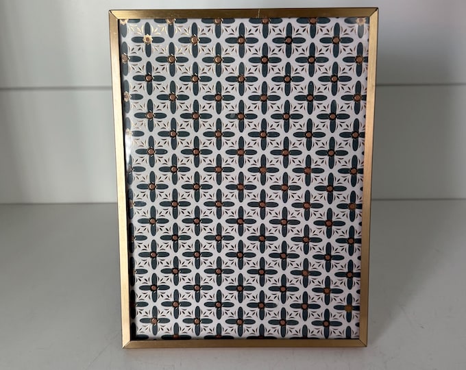 Vintage gold 6"x 8" frame holds a 5 1/2"x 7 1/2" image