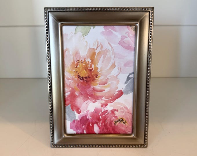 Vintage 5"x 7" silver frame holds 3 1/2"x 5 1/2"
