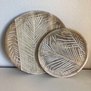 Wood platter with carved palm leaf detail