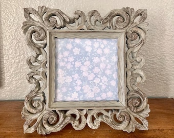 Vintage gray wood 7 x 7 inch square frame hold a 3 1/2”x 3 1/2” image. Stand only