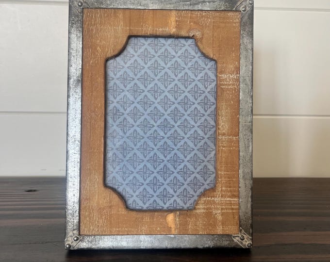 Vintage wood and metal 8" x 6” frame with ornate detailing holds approximately eight 3 1/2x 5 1/2" photo